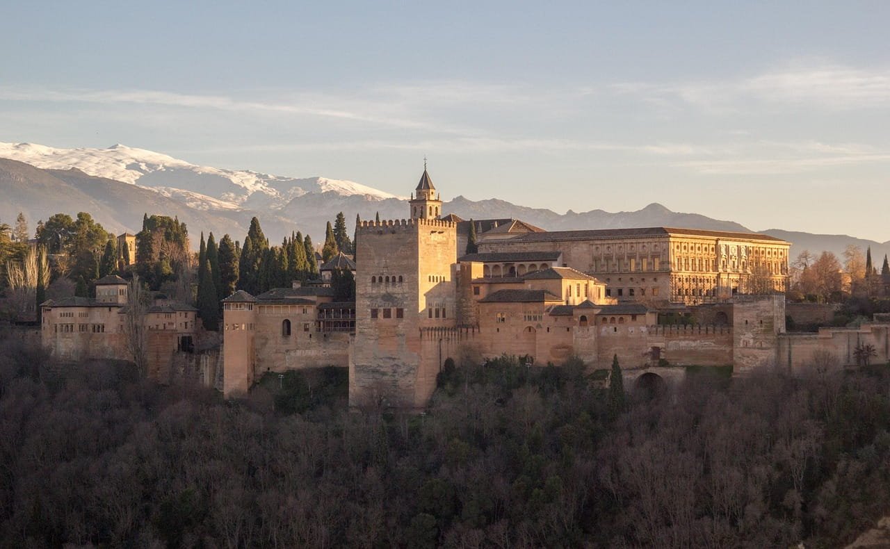 View of the Alhambra and Sierra Nevada from the Mirador de San Nicolas in Granada
