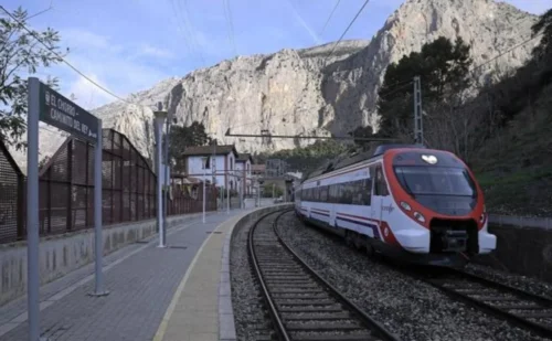 Renfe regional train arriving at El Chorro Caminito del Rey station in the Malaga countryside