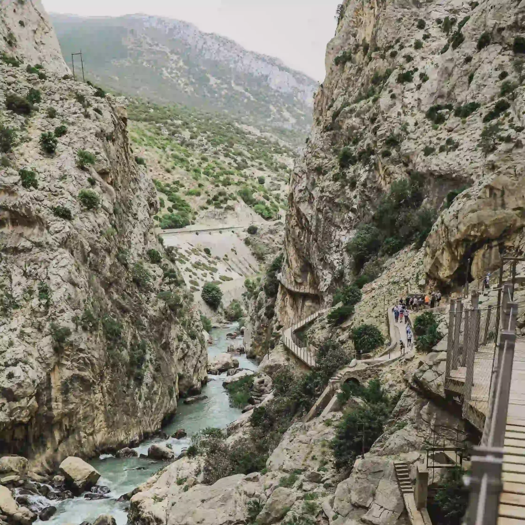 Wooden boardwalk of Caminito del Rey clinging to the gorge walls near Malaga